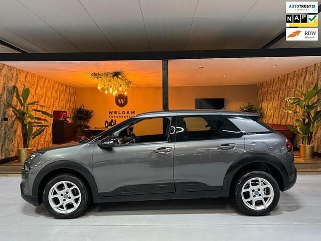 Grijs, metallic lak Gebruikt 2019 Citroën C4 Cactus PureTech Hatchback | € 13.990 (Eerlijke prijs) - Afbeelding 1/4