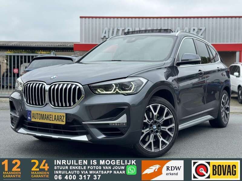 Grijs, metallic lak Gebruikt 2020 BMW X1 Comfort Edition SUV | € 28.940 (Eerlijke prijs) - Afbeelding 1/4