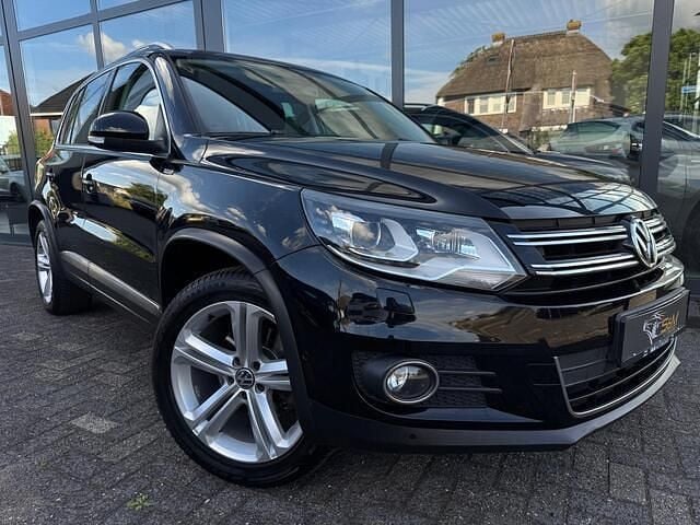 Zwart Gebruikt 2013 VW Tiguan R-line Edition SUV | € 11.950 (Goede deal) - Afbeelding 1/4