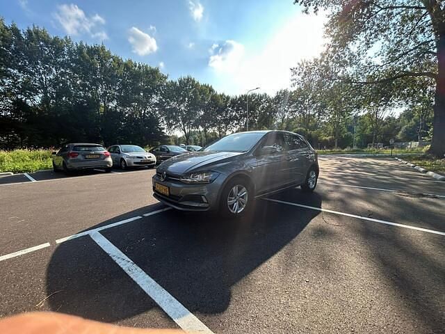 Grijs Gebruikt 2019 VW Polo Comfortline Hatchback | € 16.450 (Eerlijke prijs) - Afbeelding 1/4