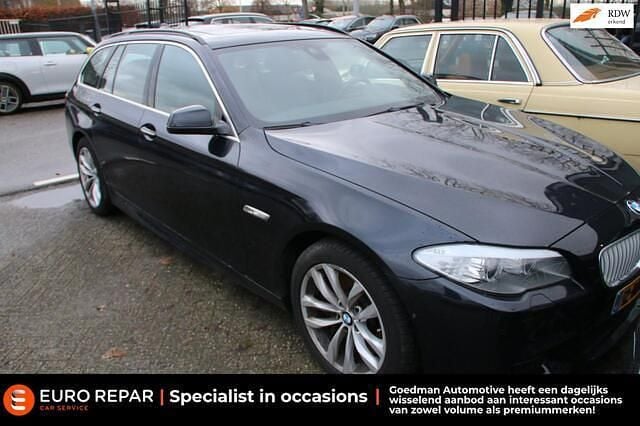 Zwart Occasion 2013 BMW M550 Sedan | € 5.995 - Afbeelding 1/4