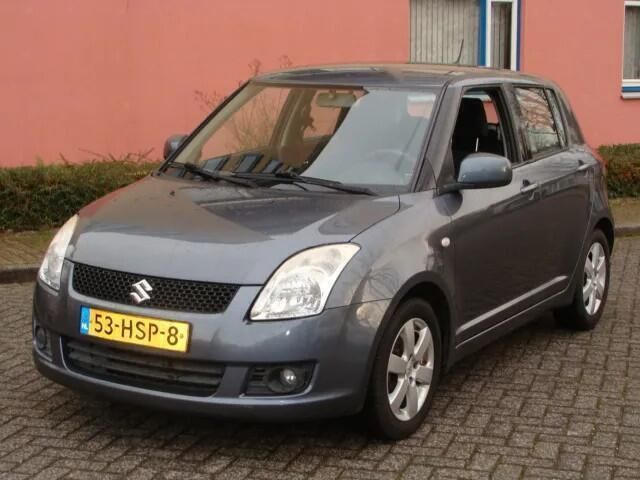 Grijs Gebruikt 2009 Suzuki Swift Hatchback | € 4.249 (Eerlijke prijs) - Afbeelding 1/4