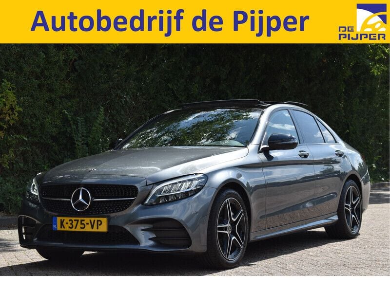 Grijs, metallic lak Gebruikt 2021 Mercedes C180 Business Sedan | € 28.950 (Goede deal) - Afbeelding 1/3