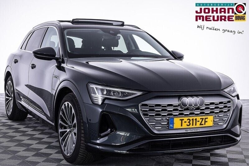 Grijs, metallic lak Gebruikt 2023 Audi Q8 e-tron Advanced SUV | € 54.900 (Goede deal) - Afbeelding 1/4