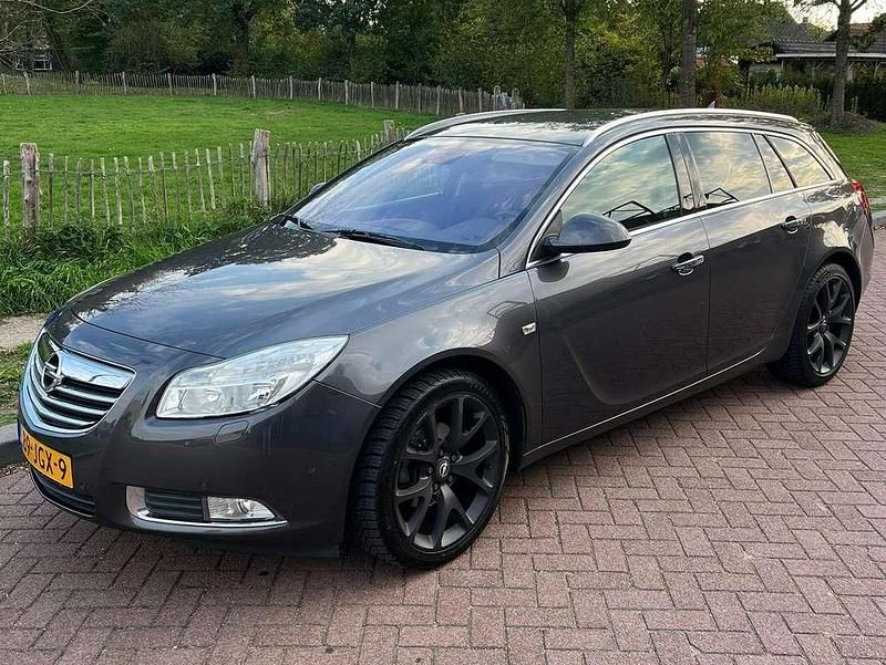 Bruin Occasion 2009 Opel Astra Cosmo Stationwagen | € 4.000 (Duur) - Afbeelding 1/4