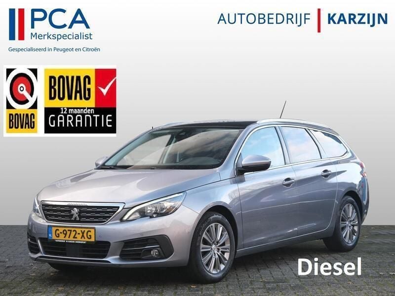 Grijs Gebruikt 2019 Peugeot 308 Premium Stationwagen | € 13.950 (Duur) - Afbeelding 1/4