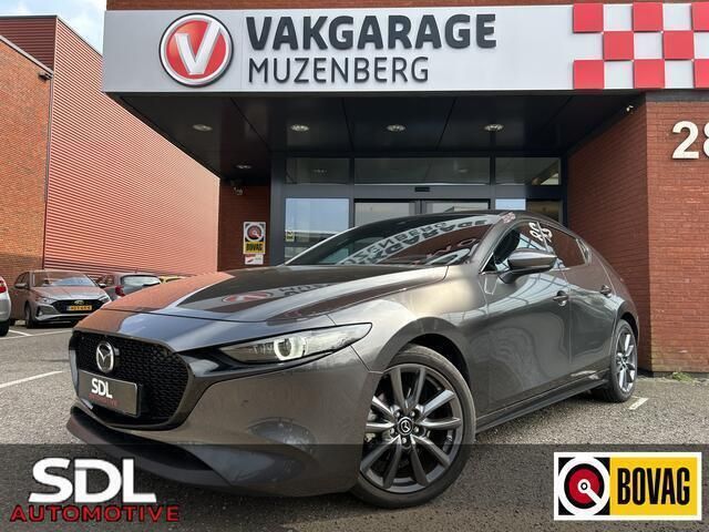Grijs Gebruikt 2022 Mazda 3 Luxury Hatchback | € 23.945 (Goede deal) - Afbeelding 1/4