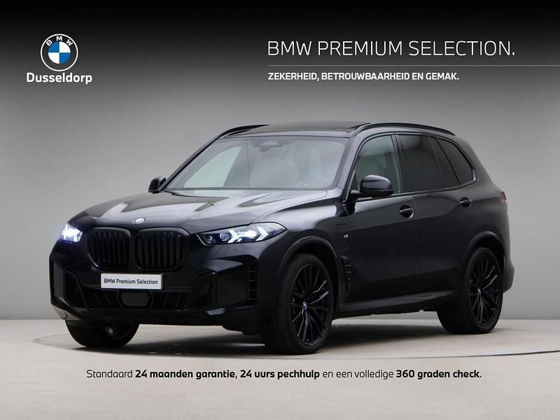M carbonschwarz metallic (donker blauw metallic) Gebruikt 2024 BMW X5 Comfort Edition SUV | € 99.950 (Eerlijke prijs) - Afbeelding 1/4