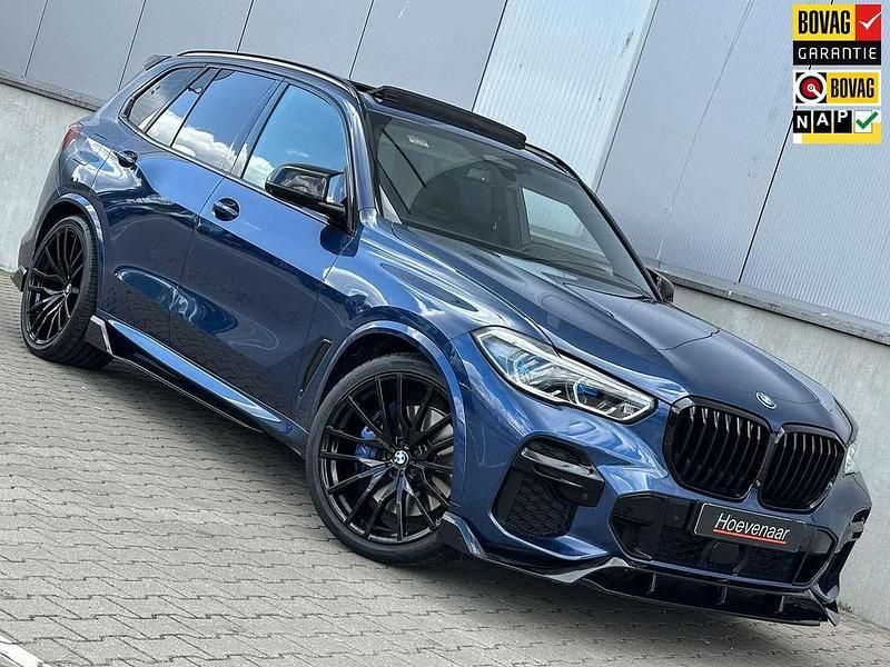 Blauw, metallic lak Gebruikt 2021 BMW X5 M Sport SUV | € 72.999 (Duur) - Afbeelding 1/4