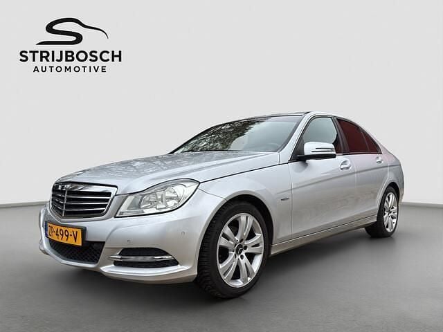 Grijs (metallic) Gebruikt 2011 Mercedes C180 Business Sedan | € 3.990 (Super prijs) - Afbeelding 1/4