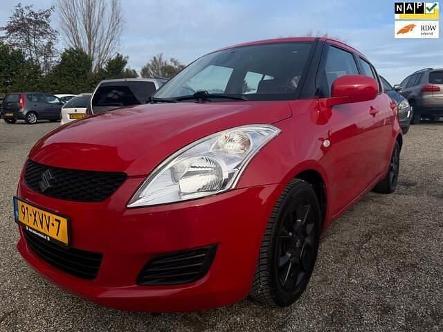 Rood Occasion 2012 Suzuki Swift Comfort Hatchback | € 6.950 (Goede deal) - Afbeelding 1/4