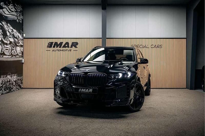 Zwart (metallic) Gebruikt 2024 BMW X5 M Performance SUV | € 114.950 - Afbeelding 1/4
