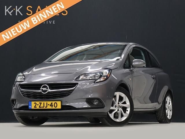 Grijs, metallic lak Gebruikt 2015 Opel Corsa Edition+ Hatchback | € 5.940 (Goede deal) - Afbeelding 1/4