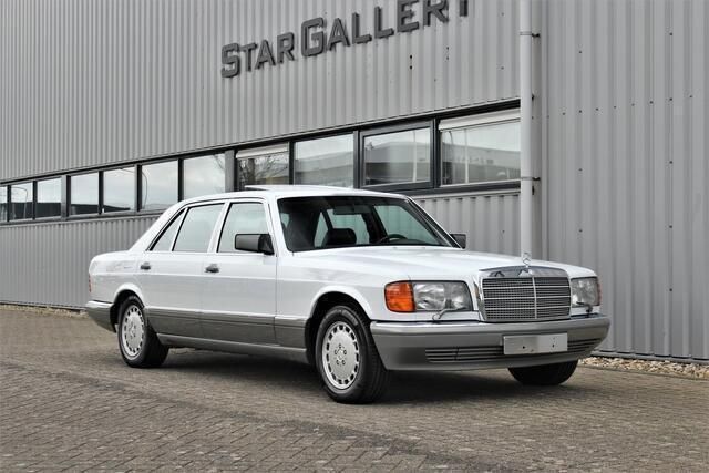 Wit Gebruikt 1987 Mercedes S560 Sedan | € 27.950 - Afbeelding 1/4