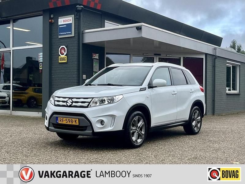 Wit Gebruikt 2015 Suzuki Vitara Exclusive SUV | € 12.950 (Goede deal) - Afbeelding 1/4