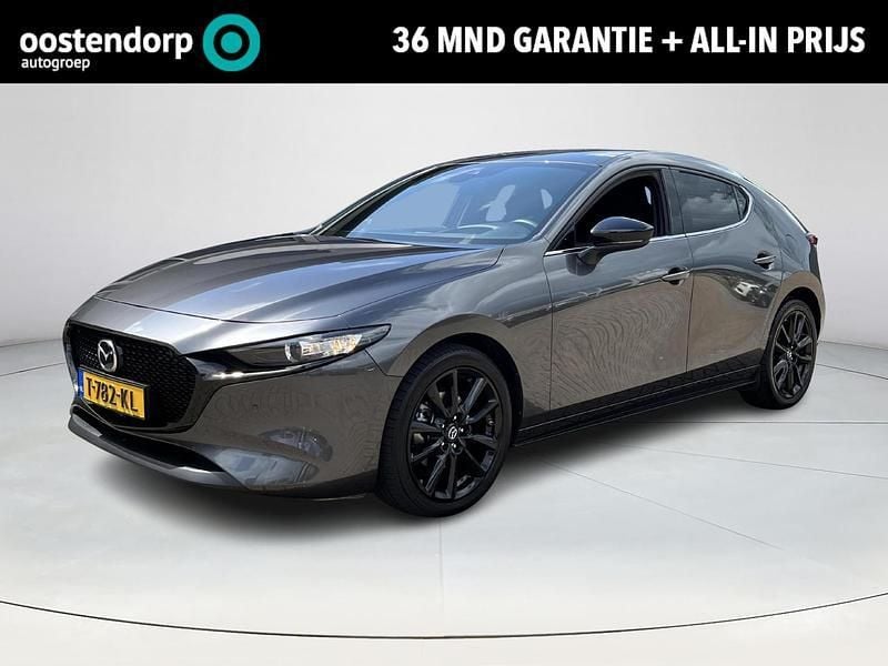 Grijs Gebruikt 2023 Mazda 3 Homura-Line Hatchback | € 26.740 (Eerlijke prijs) - Afbeelding 1/4