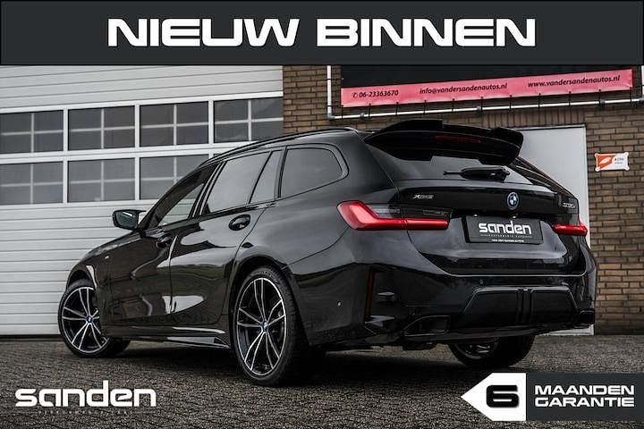 Occasion BMW 330e 292 PK (214 kW) 2023 Zwart Stationwagen