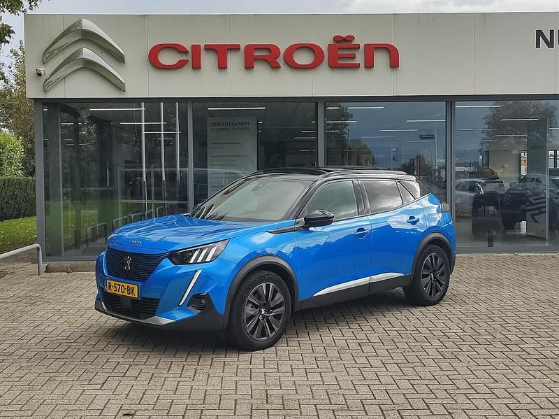 Blauw Gebruikt 2021 Peugeot e-2008 GTi SUV | € 18.540 (Eerlijke prijs) - Afbeelding 1/4