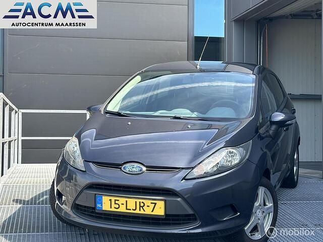 Grijs Occasion 2010 Ford Fiesta Titanium Hatchback | € 3.995 (Iets duurder) - Afbeelding 1/4