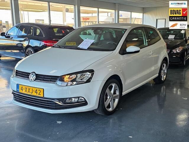 Wit Gebruikt 2014 VW Polo Highline Hatchback | € 6.450 (Eerlijke prijs) - Afbeelding 1/4
