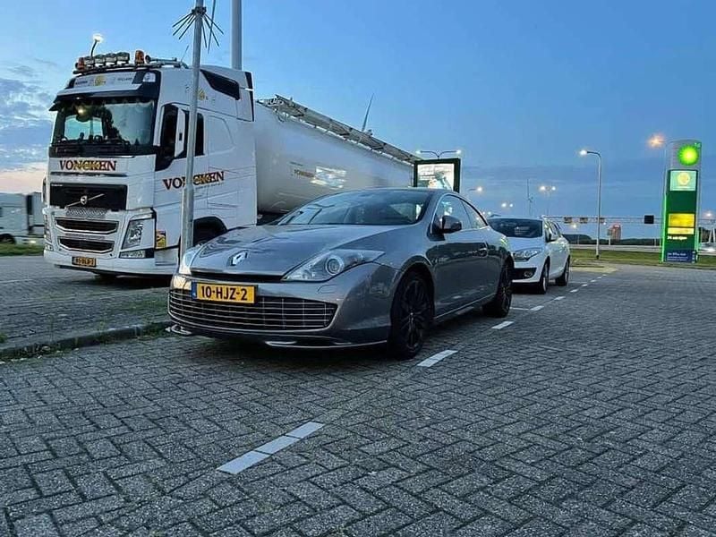 Grijs Gebruikt 2009 Renault Laguna Coupé Initiale Coupé | € 7.850 - Afbeelding 1/4