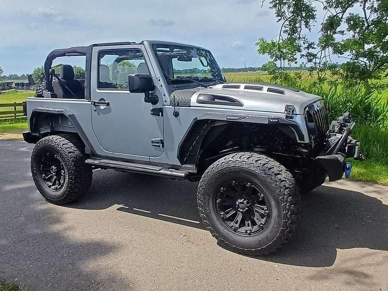 Zilver Gebruikt 2015 Jeep Wrangler Sport SUV | € 26.950 - Afbeelding 1/4