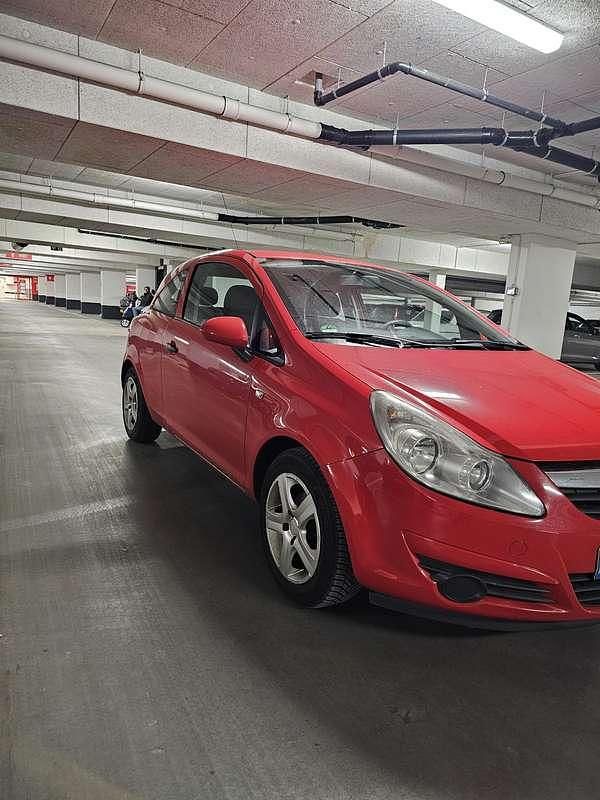 Rood Occasion 2010 Opel Corsa Selection Hatchback | € 800 (Super prijs) - Afbeelding 1/4