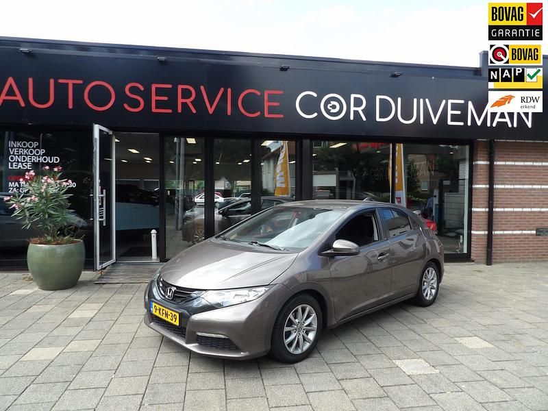 Bruin, metallic lak Gebruikt 2013 Honda Civic Comfort Hatchback | € 8.750 (Eerlijke prijs) - Afbeelding 1/4