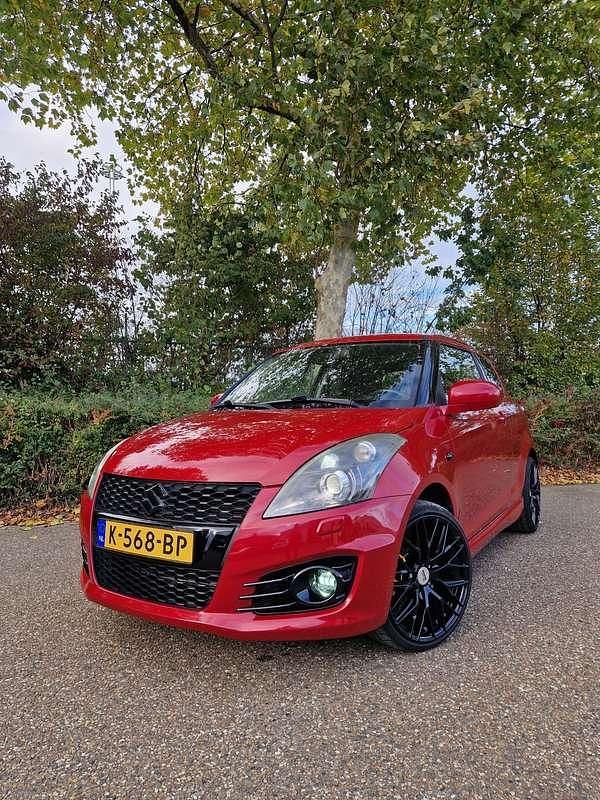 Rood Gebruikt 2012 Suzuki Swift Sport Hatchback | € 7.999 (Eerlijke prijs) - Afbeelding 1/4