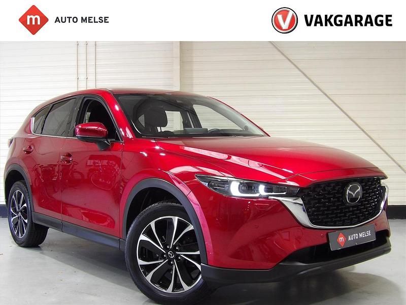 Rood (metallic) Gebruikt 2023 Mazda CX-5 Exclusive-Line SUV | € 34.950 - Afbeelding 1/4