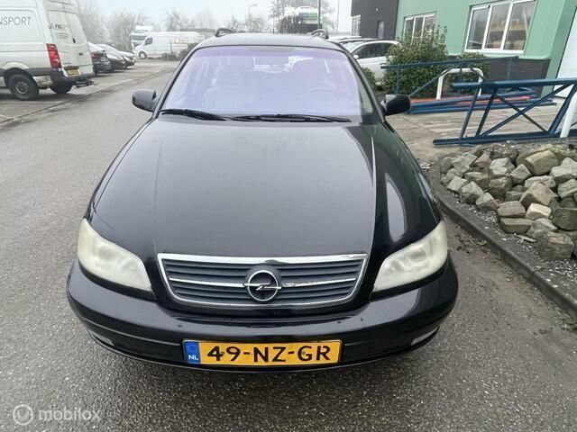 Zwart Gebruikt 2004 Opel Omega Edition Stationwagen | € 1.450 - Afbeelding 1/4