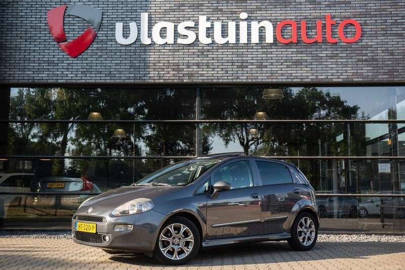 Grijs, metallic lak Gebruikt 2015 Fiat Punto Evo Lounge Hatchback | € 3.950 (Eerlijke prijs) - Afbeelding 1/4