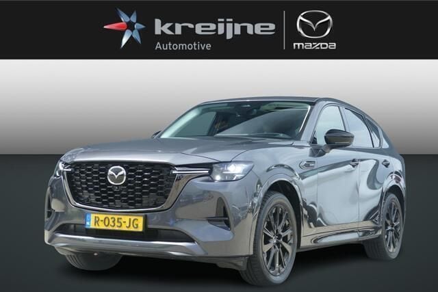 Machine gray Gebruikt 2022 Mazda CX-60 Homura-Line SUV | € 38.925 (Eerlijke prijs) - Afbeelding 1/4