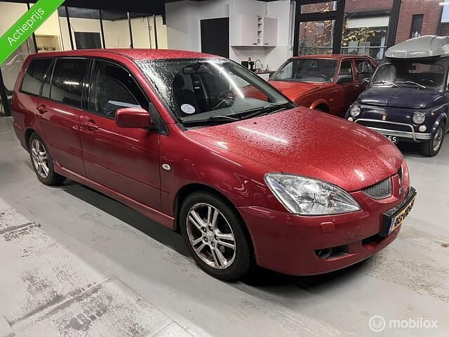Rood Gebruikt 2004 Mitsubishi Lancer Stationwagen | € 899 - Afbeelding 1/4