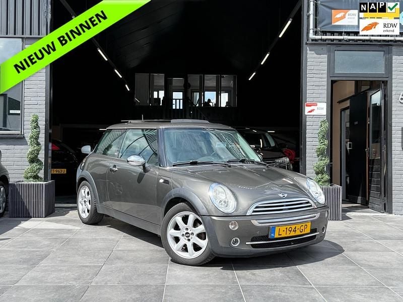Bruin Gebruikt 2006 Mini Cooper Hatchback | € 4.944 (Iets duurder) - Afbeelding 1/4