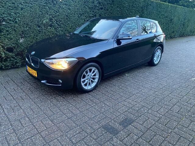 Zwart Gebruikt 2015 BMW 116 Executive Hatchback | € 8.750 (Super prijs) - Afbeelding 1/4