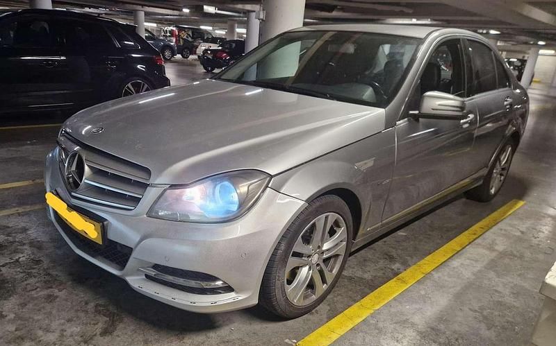 Grijs Gebruikt 2012 Mercedes C220 Sedan | € 7.500 (Eerlijke prijs) - Afbeelding 1/4