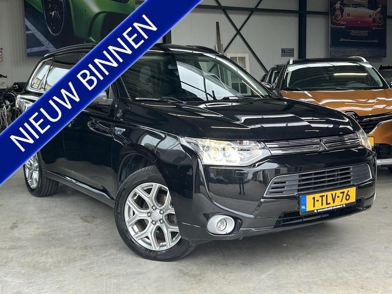 Zwart Gebruikt 2014 Mitsubishi Outlander P-HEV Instyle SUV | € 7.450 (Iets duurder) - Afbeelding 1/4