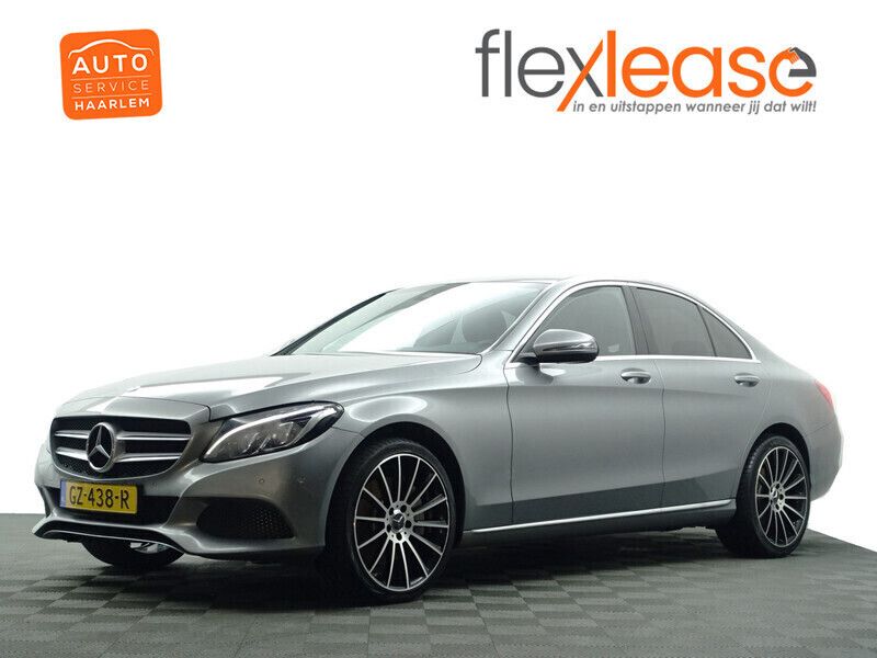 Grijs metallic Gebruikt 2015 Mercedes C350e Prestige Sedan | € 17.900 (Goede deal) - Afbeelding 1/4