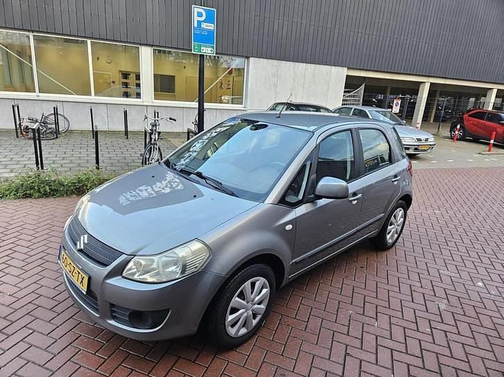 Grijs Gebruikt 2006 Suzuki SX4 MPV | € 2.495 (Goede deal) - Afbeelding 1/4