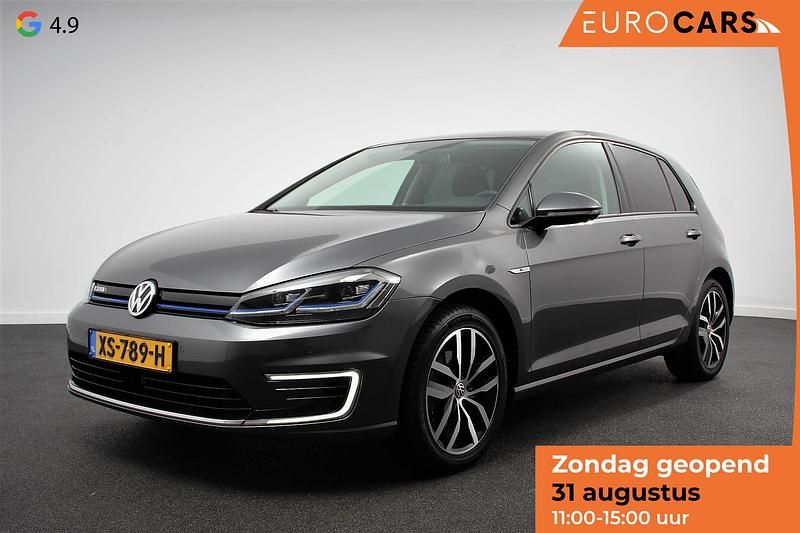 Grijs, metallic lak Gebruikt 2019 VW e-Golf Hatchback | € 13.990 (Iets duurder) - Afbeelding 1/4