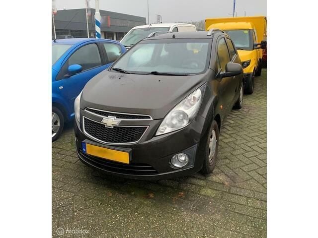 Bruin Gebruikt 2010 Chevrolet Spark Hatchback | € 999 (Goede deal) - Afbeelding 1/4