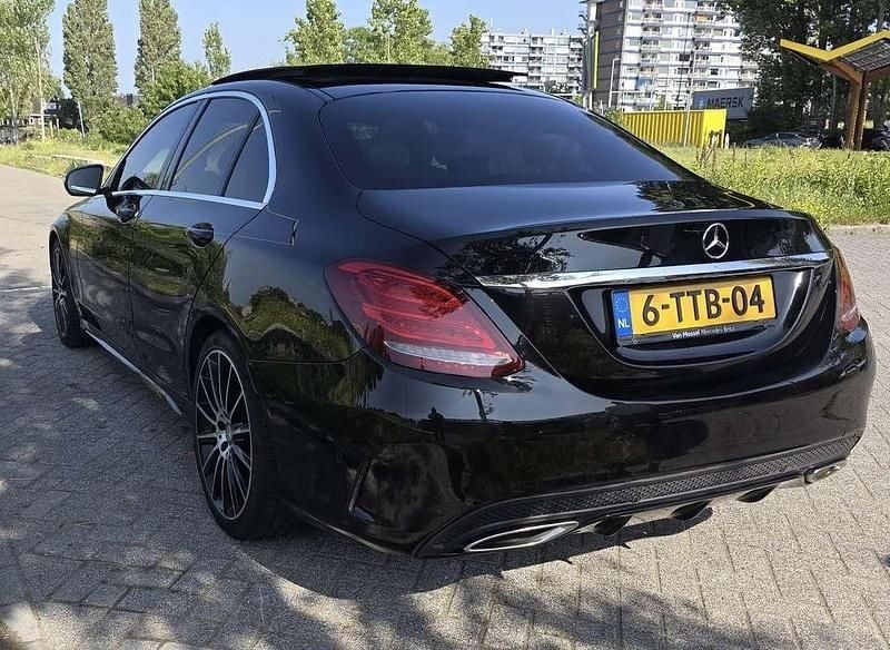 Zwart Gebruikt 2014 Mercedes C180 AMG line Sedan | € 16.500 (Goede deal) - Afbeelding 1/4