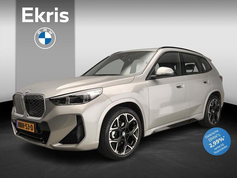 Grijs Gebruikt 2025 BMW iX1 M Sport SUV | € 45.900 (Eerlijke prijs) - Afbeelding 1/4