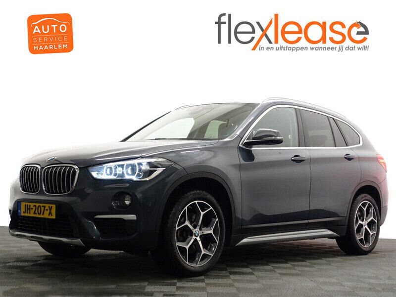 Grijs metallic Gebruikt 2016 BMW X1 Executive SUV | € 14.900 - Afbeelding 1/4
