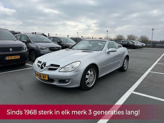 Grijs, metallic lak Gebruikt 2006 Mercedes SLK200 Cabriolet | € 9.690 (Goede deal) - Afbeelding 1/4