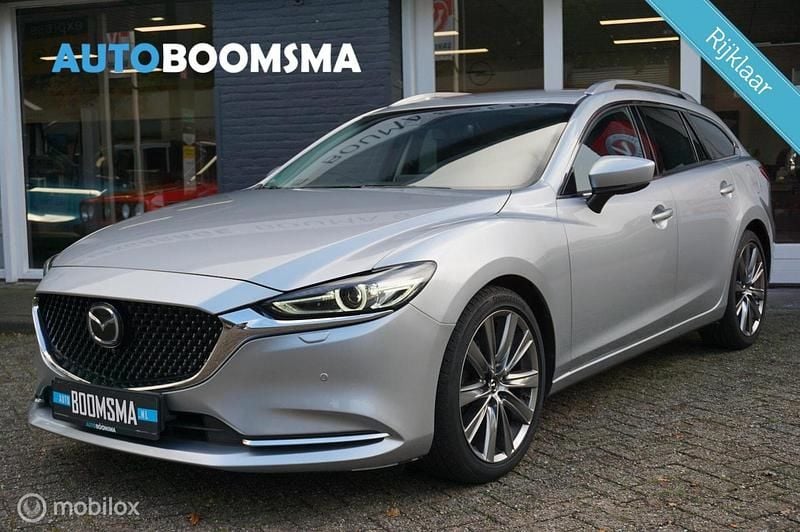 Zilver (metallic) Gebruikt 2019 Mazda 6 Inclusive Stationwagen | € 23.900 (Eerlijke prijs) - Afbeelding 1/4
