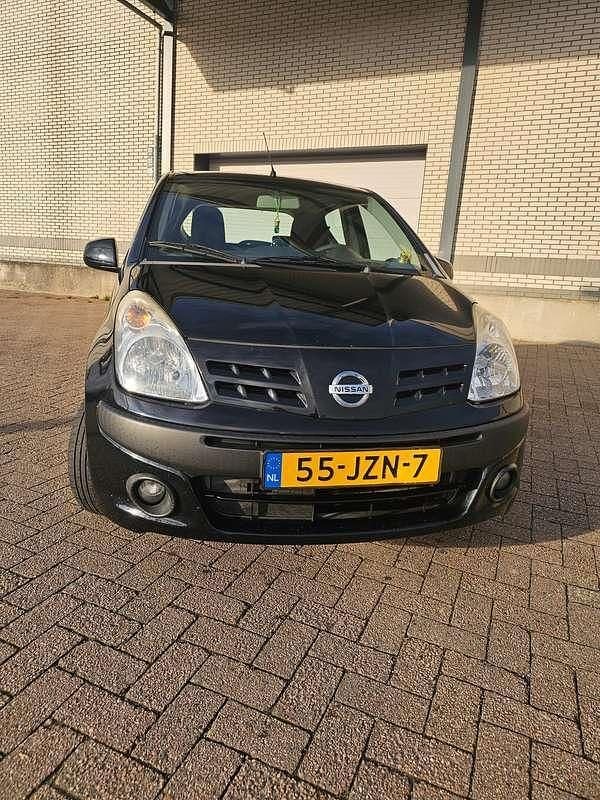 Zwart Gebruikt 2009 Nissan Pixo Acenta Hatchback | € 2.800 (Eerlijke prijs) - Afbeelding 1/4