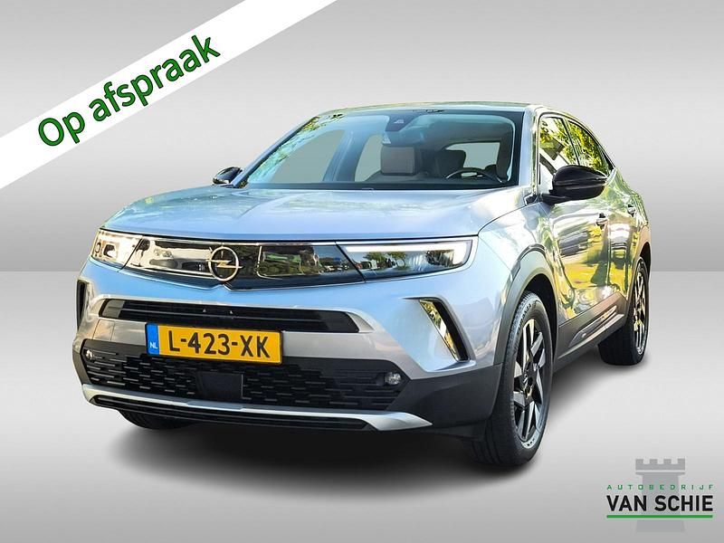 Grijs Gebruikt 2021 Opel Mokka-e Elegance SUV | € 14.900 (Eerlijke prijs) - Afbeelding 1/4