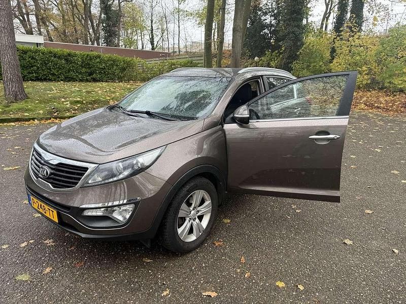 Bruin Occasion 2013 Kia Sportage Plus SUV | € 8.000 (Eerlijke prijs) - Afbeelding 1/4